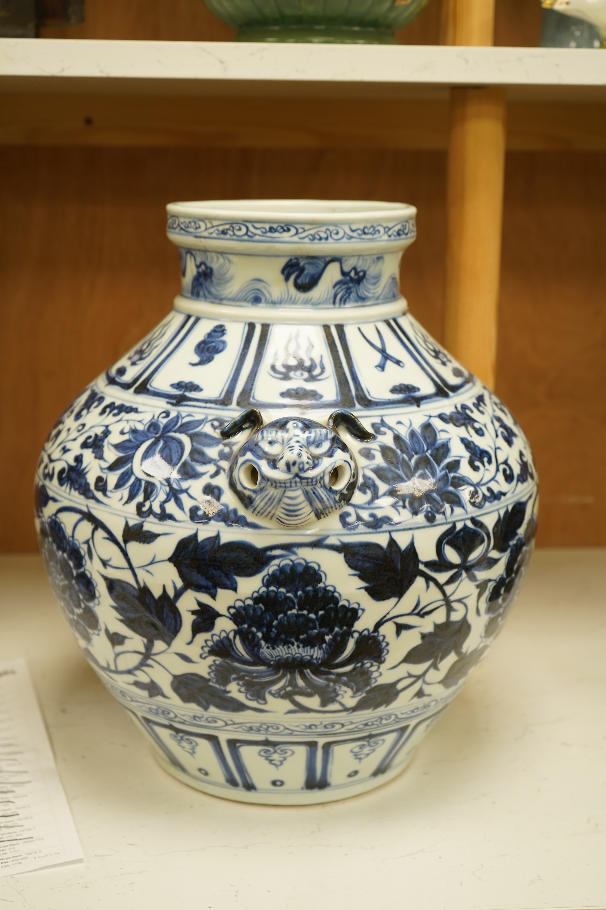 A Chinese blue and white pot vase with zoological handles, 38cm high